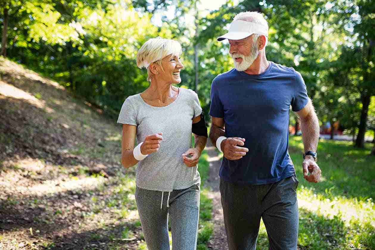 Senior couple jogging and running