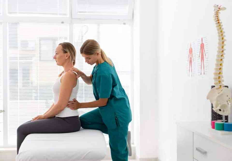 chiropractic adjustment doctor and patient